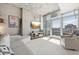 Modern living room with hardwood floors and city views at 1700 Bassett St # 1008, Denver, CO 80202