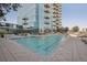 Large rectangular pool with surrounding patio and building view at 1700 Bassett St # 1008, Denver, CO 80202