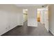 Bright bedroom featuring gray carpet, closet, and ensuite bathroom at 4691 S Decatur St # 212, Englewood, CO 80110