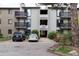 Condominium complex featuring balconies, outdoor parking, and inviting entryways, ideal for comfortable living and community connection at 6505 Kalua Rd # 204B, Boulder, CO 80301
