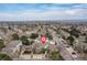 Aerial view of a residential community with well-maintained streets and landscaping at 9620 W Chatfield Ave # D, Littleton, CO 80128