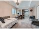 Inviting bedroom featuring a cozy bed, modern desk, and comfortable seating area at 2896 Gemini Loop, Broomfield, CO 80023