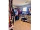 Walk-in closet with custom shelving and organization systems for ample storage space at 2896 Gemini Loop, Broomfield, CO 80023