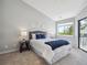 Bedroom features carpet and large windows at 5690 W 80Th Pl # 101, Arvada, CO 80003