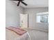Bedroom with vaulted ceilings, carpeting, and an open doorway at 5690 W 80Th Pl # 101, Arvada, CO 80003