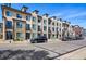 Modern townhomes showcase stone accents, private balconies, and convenient street parking at 1919 Eaton St, Lakewood, CO 80214