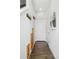 Inviting hallway featuring wood floors, storage and modern decor, creating a warm and welcoming entrance at 1919 Eaton St, Lakewood, CO 80214
