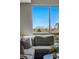 Comfortable seating area with a large window offering city views, creating a serene and inviting atmosphere at 1919 Eaton St, Lakewood, CO 80214
