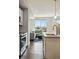Open floor plan with kitchen, dining area, and comfortable living space at 1919 Eaton St, Lakewood, CO 80214