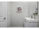 Clean powder room features a modern vanity and contemporary decor at 1919 Eaton St, Lakewood, CO 80214