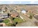 Aerial view showcasing the backyard, neighborhood, and surrounding landscape at 1294 Kittery St, Castle Rock, CO 80104
