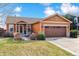 Charming single-Gathering home with a two-car garage and landscaped front yard at 1294 Kittery St, Castle Rock, CO 80104