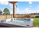 Inviting backyard hot tub for relaxation and entertainment with beautiful scenery at 1294 Kittery St, Castle Rock, CO 80104