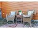 A cozy patio setting with wicker chairs offers a relaxing outdoor space at 1294 Kittery St, Castle Rock, CO 80104
