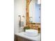 Close-up of a stylish bathroom vanity with a vessel sink and modern fixtures at 1620 S Ogden St, Denver, CO 80210