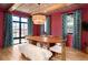 Bright dining room with hardwood floors, modern lighting, and large windows at 1620 S Ogden St, Denver, CO 80210