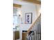 Elegant fireplace with decorative art, built-in cabinets, and hardwood floors at 1620 S Ogden St, Denver, CO 80210