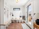 Bright mudroom with cubbies, bench, and easy access to outdoors at 1620 S Ogden St, Denver, CO 80210