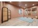 Studio space with wood floors, mirrors, and yoga mats at 1620 S Ogden St, Denver, CO 80210