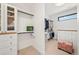 Spacious walk-in closet featuring custom shelving and storage solutions at 1620 S Ogden St, Denver, CO 80210