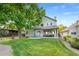 Well-maintained backyard with a patio and manicured lawn at 8040 W 78Th Cir, Arvada, CO 80005