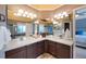 Spacious bathroom featuring dual sinks, ample mirror space, and plenty of vanity storage at 8040 W 78Th Cir, Arvada, CO 80005