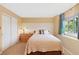 Inviting bedroom offering great natural light and a calming color palette for a peaceful retreat at 8040 W 78Th Cir, Arvada, CO 80005