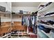 Walk-in closet with shelves, hanging rods, and ample storage for clothes, shoes, and accessories at 8040 W 78Th Cir, Arvada, CO 80005