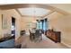 Elegant dining room with stylish lighting, hardwood floors, and a cozy atmosphere at 8040 W 78Th Cir, Arvada, CO 80005