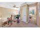 Upstairs hallway with view of a bedroom, staircase and chandelier at 8040 W 78Th Cir, Arvada, CO 80005