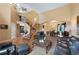 Open-concept living area with soaring ceilings, hardwood floors, and views to the dining area at 8040 W 78Th Cir, Arvada, CO 80005