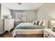 Bedroom with hard wood floors and dresser at 19690 E Mann Creek Dr # A, Parker, CO 80134