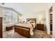 Comfortable bedroom with a large arched window and lots of light at 19690 E Mann Creek Dr # A, Parker, CO 80134