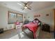 Bright bedroom with plenty of natural light and an adorable vanity at 6637 Berry Bush Ln, Evergreen, CO 80439