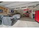 Organized two-car garage with sports team décor and ample space at 6637 Berry Bush Ln, Evergreen, CO 80439