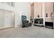 Bright living room featuring a cozy fireplace with hearth, and built-in shelving at 20886 Parliament Pl, Parker, CO 80138