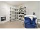 Organized storage room with shelving units, ample space, and a secure safe at 20886 Parliament Pl, Parker, CO 80138