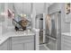 Modern kitchen featuring stainless steel appliances and gray cabinets at 1102 Conifer Ct, Highlands Ranch, CO 80126