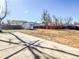 Spacious backyard with shed and concrete pad, perfect for outdoor entertaining or relaxation at 5539 Atchison St, Denver, CO 80239