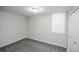 Neutral bedroom with carpet floors features window and closet at 5539 Atchison St, Denver, CO 80239