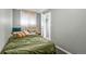 Bedroom featuring window with curtains, a bed, pillows and carpet at 2101 S Josephine St # 202, Denver, CO 80210