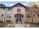 Beautiful brick building with large windows, decorated doorway and well-kept landscaping at 2101 S Josephine St # 202, Denver, CO 80210