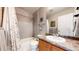 Bright bathroom with a shower and tub combination featuring tile accents and granite countertops at 10449 Paris St # 207, Commerce City, CO 80640