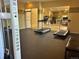 A modern community fitness center featuring treadmills and weight-training machines at 10449 Paris St # 207, Commerce City, CO 80640