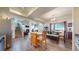 Kitchen opens to the dining area and living room. Stainless steel appliances and island with seating at 10449 Paris St # 207, Commerce City, CO 80640