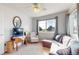 Inviting living room with a comfortable couch, creating a cozy space for relaxation at 10449 Paris St # 207, Commerce City, CO 80640