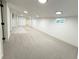 Large finished basement area with bright lighting at 3355 Moorhead Ave, Boulder, CO 80305