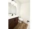 Stylish powder room featuring a modern vanity and fixtures at 3355 Moorhead Ave, Boulder, CO 80305