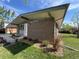 A stylish brick home boasting modern design elements, a covered carport, and carefully landscaped grounds for enhanced curb appeal at 3355 Moorhead Ave, Boulder, CO 80305