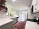 Charming kitchen featuring stainless steel appliances, white countertops and colorful rug at 3355 Moorhead Ave, Boulder, CO 80305